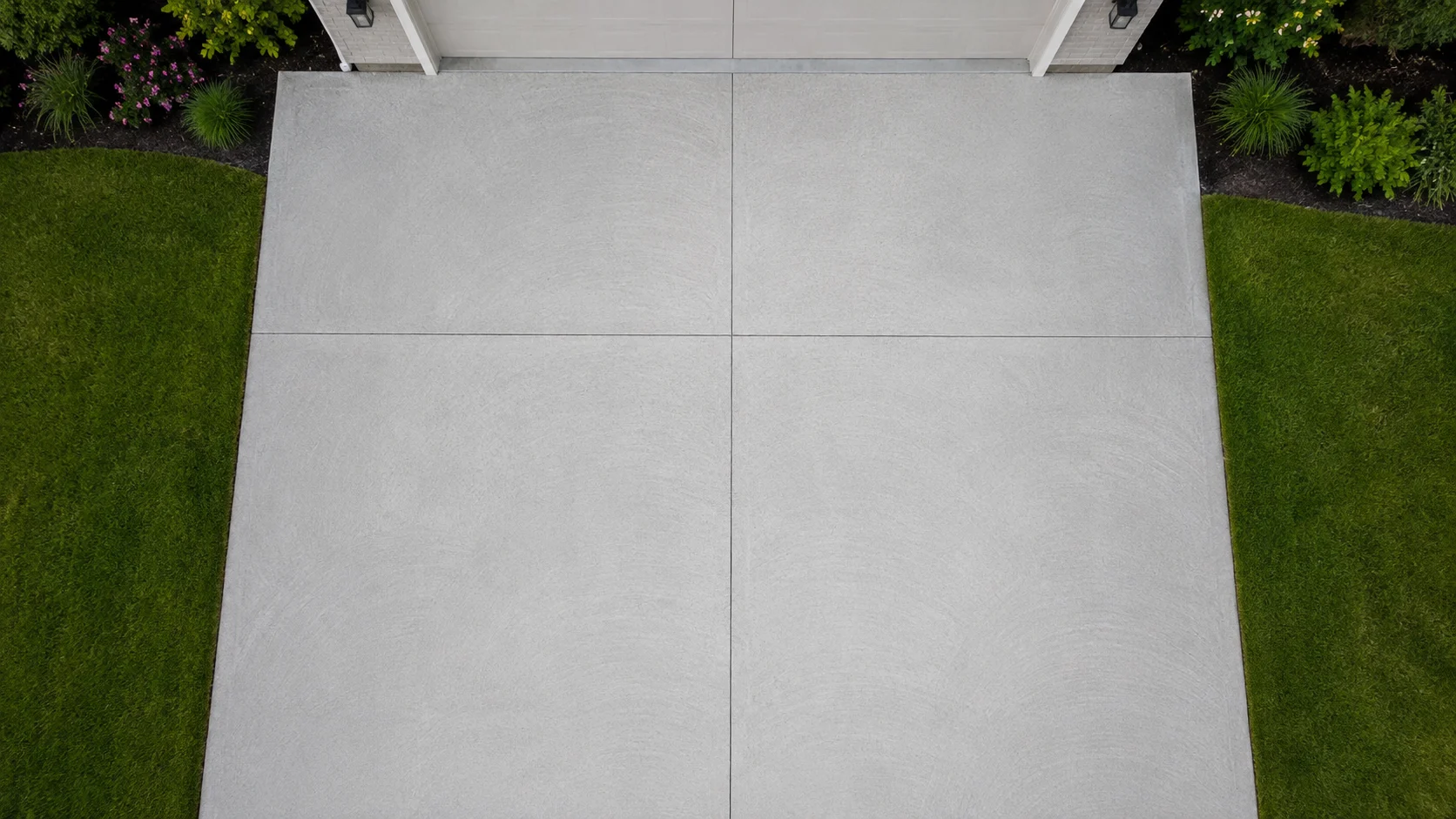 Overhead view of a clean concrete driveway